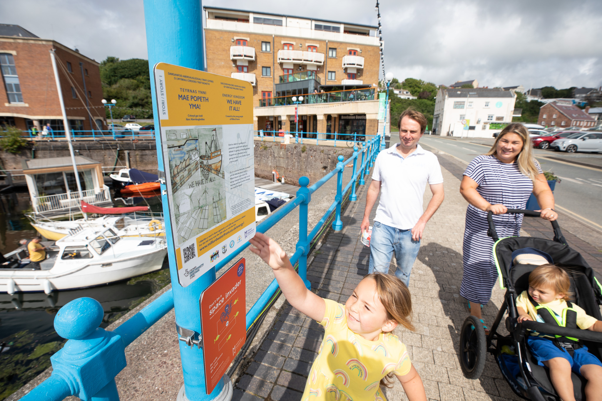 Family walking at Milford Waterfront